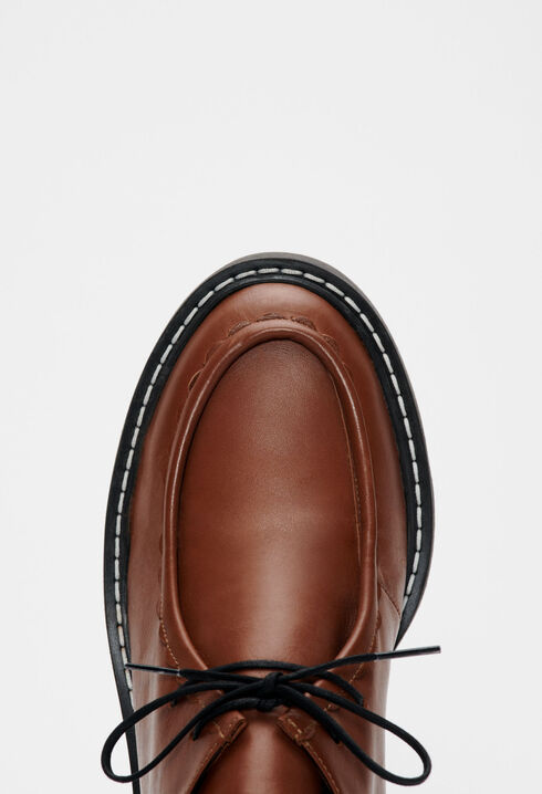 Heeled brown derbies