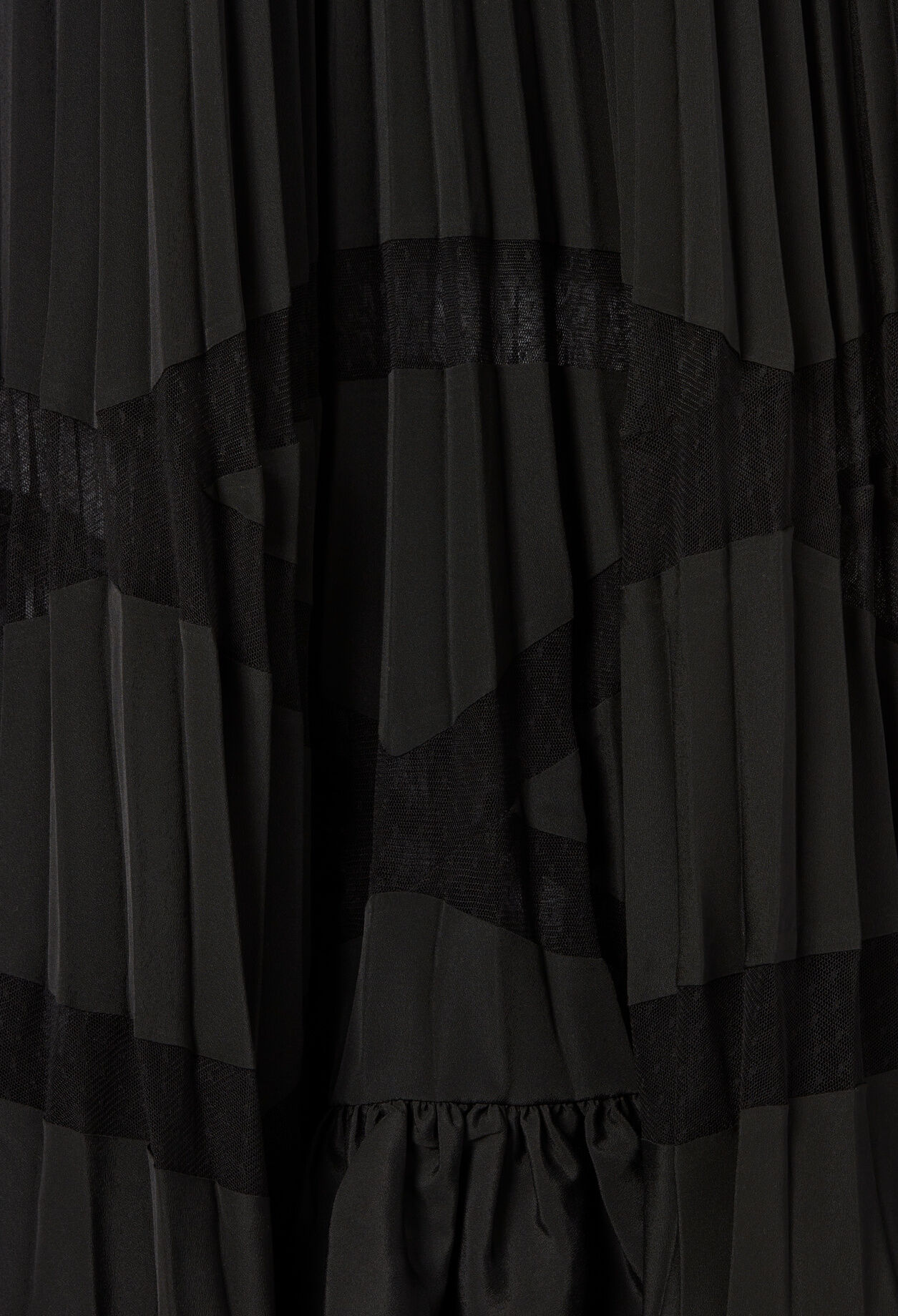 Asymmetrical pleated skirt Asymmetrical pleated skirt