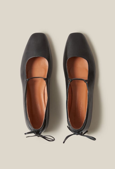 Black leather ballet pumps