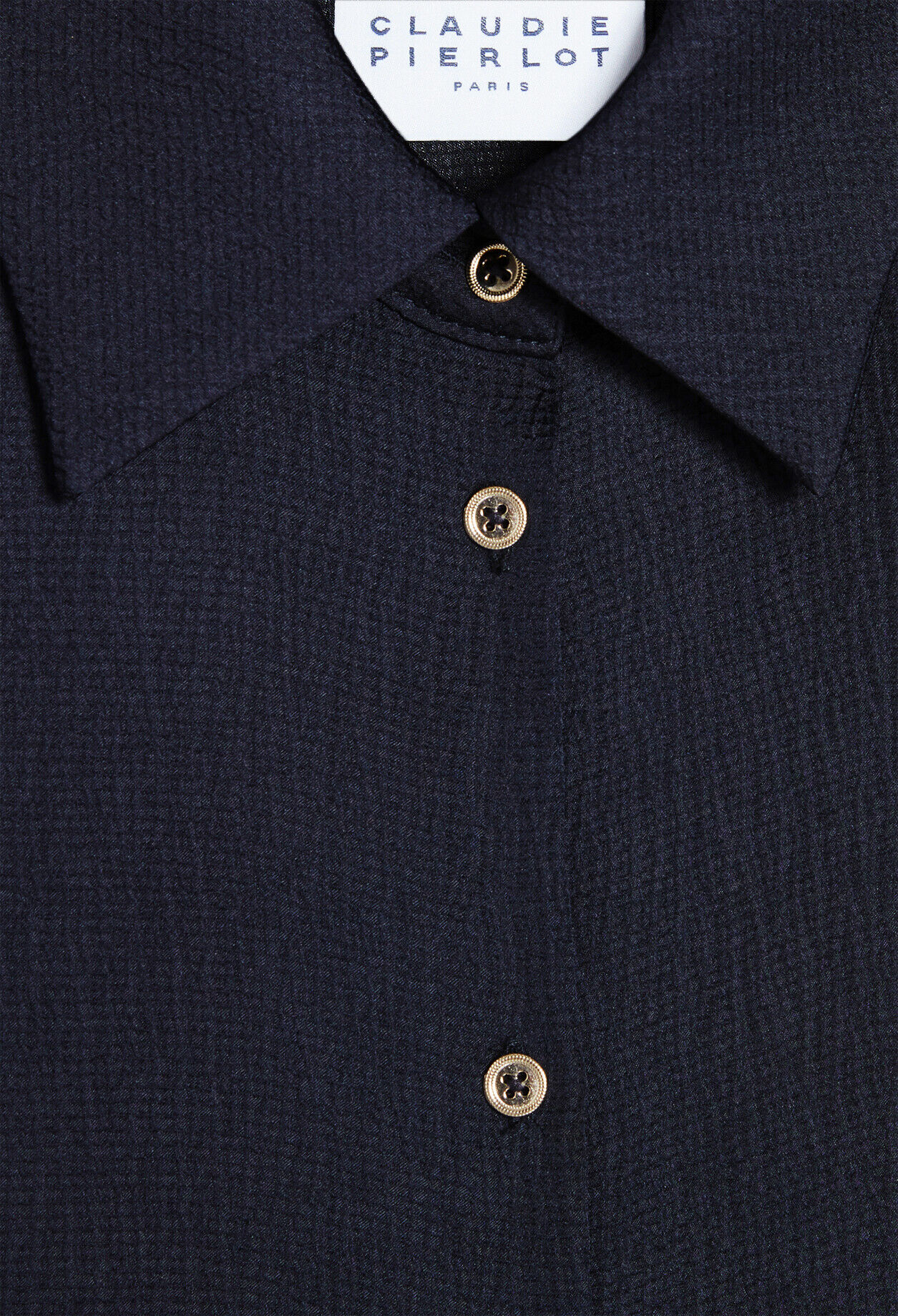 Shirt with shoulder pads