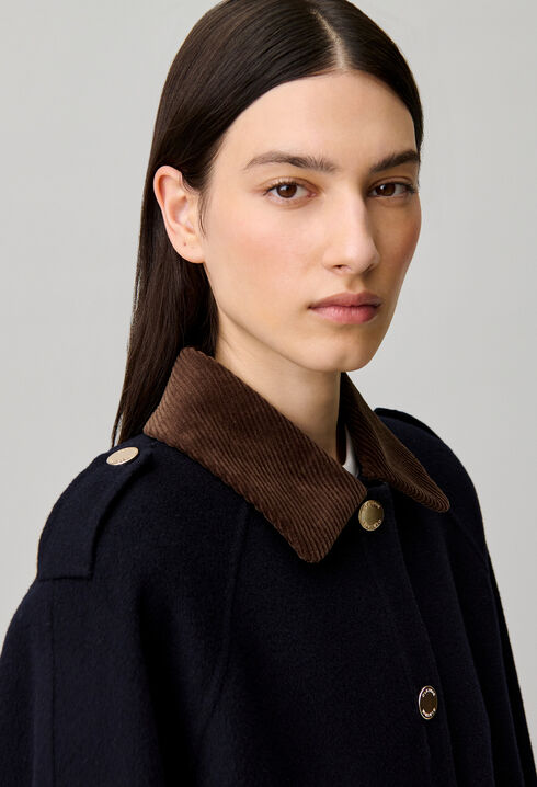 Oversized jacket with gold poppers