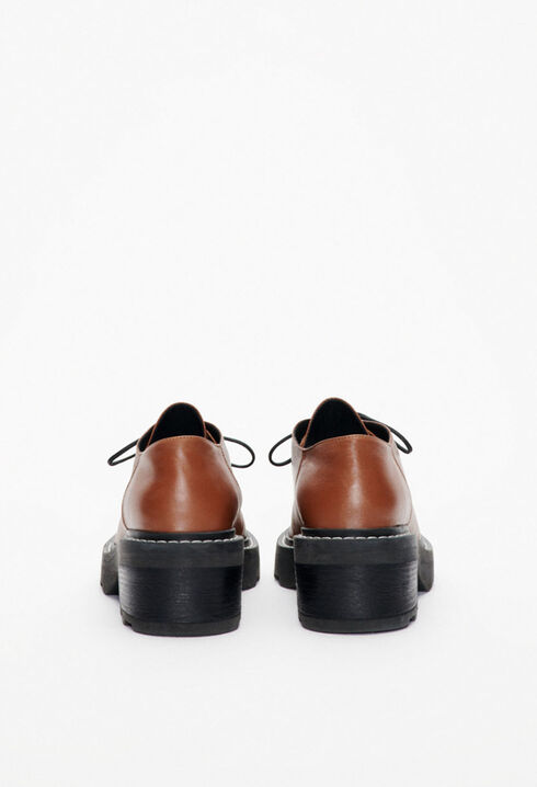 Heeled brown derbies