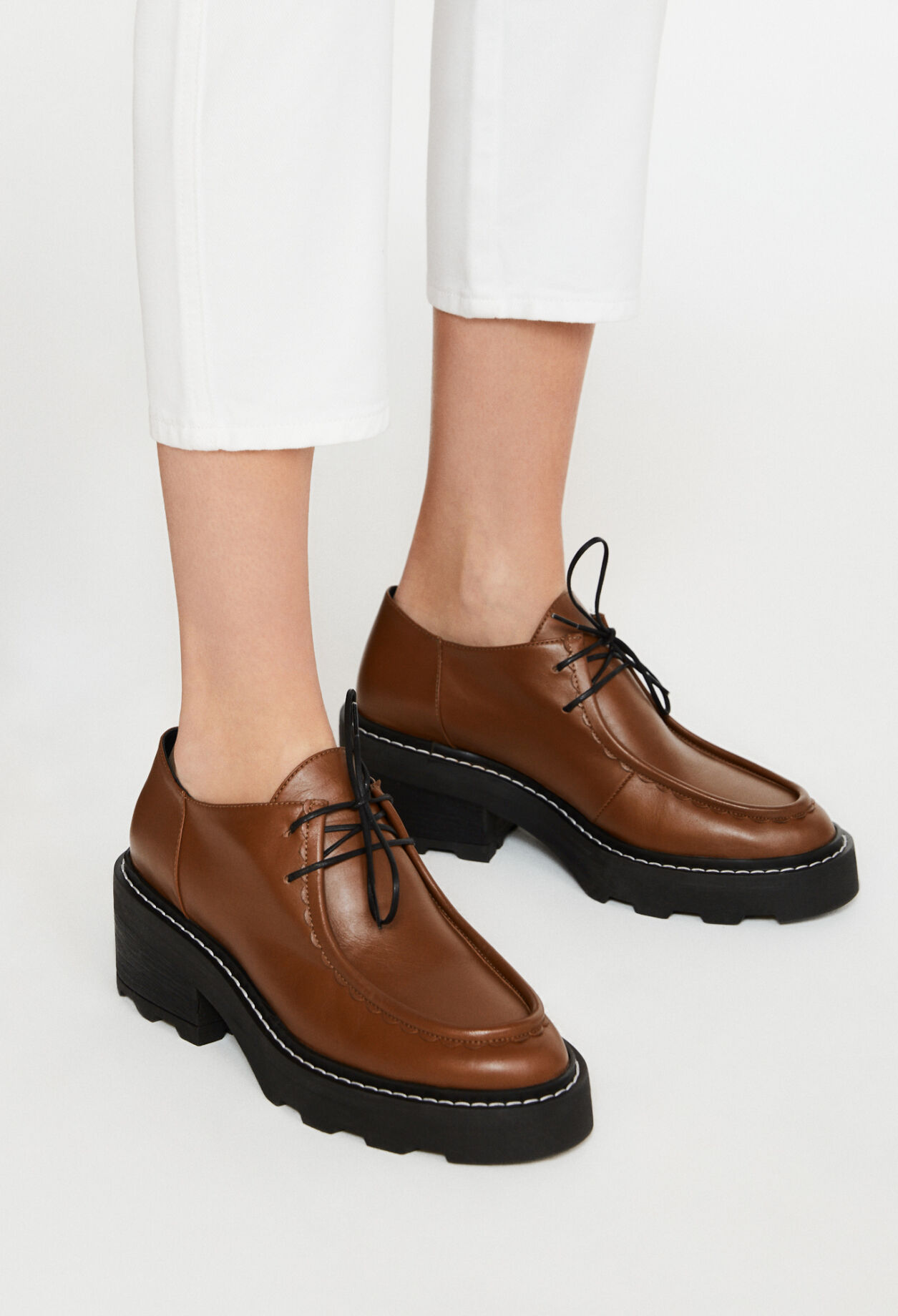 Heeled brown derbies