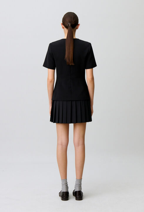 Short pleated peplum dress